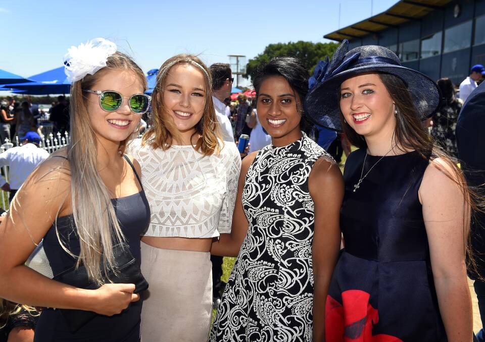 RACEGOERS: Friends Ruby Staley, Ruby Young, Kirsty Wallace and Ashleigh Prior at the 2015 Ballarat Cup. Picture: Luka Kauzlaric.