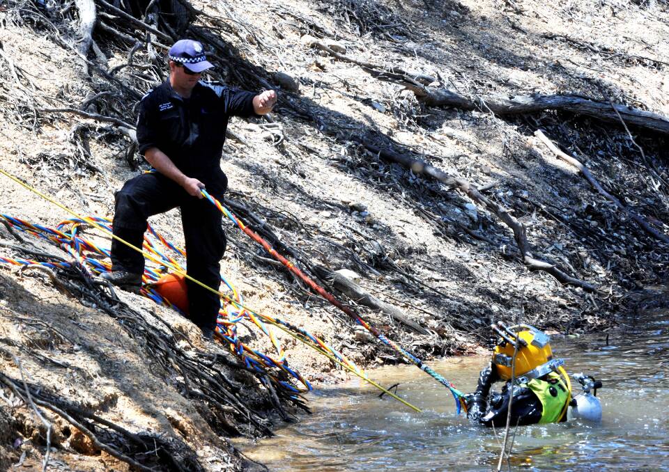 Photos from the discovery of the body on January 19, 2014: Police Search and Rescue Squad members.