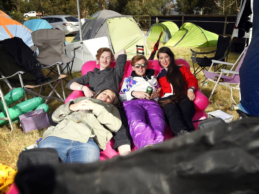 RELAX: Bec Lane, Parker Rettke, Thomas McBean and Megan Tainsh take a rest after a weekend of live entertainment. Picture: Luka Kauzlaric. 