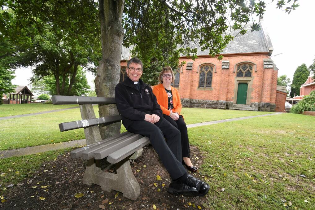 SPEAK OUT: Fr David Oulton and Mothers' Union member Denise Lay organise the 'Prayer and Candle' service to support domestic violence victims. Picture: Lachlan Bence