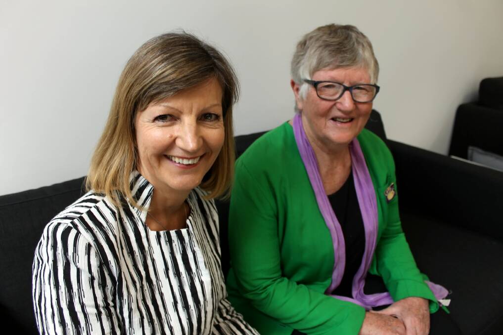 LONG TIME PIONEERS: Federation University Vice Chancellor Helen Bartlett and Emily's List pioneer Jenny Beacham share passion at International Women's Day morning tea. Picture: Rochelle Kirkham 