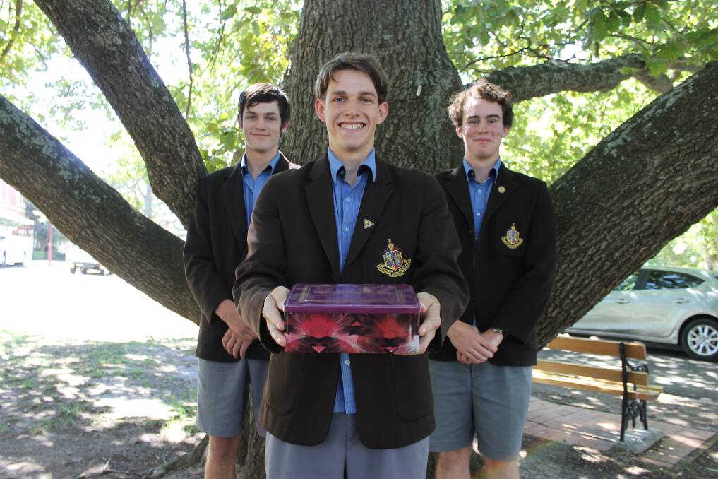 BANDING TOGETHER: Ballarat Grammar year 12 boarding house students Richard Maher, Lucas Rapp and Mitch Ryan have been calling Ballarat businesses in an effort to get raffle donations. Picture: Rochelle Kirkham 