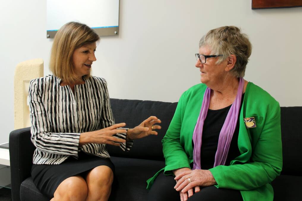LONG TIME PIONEERS: Federation University Vice Chancellor Helen Bartlett and Emily's List pioneer Jenny Beacham share passion at International Women's Day morning tea. Picture: Rochelle Kirkham 
