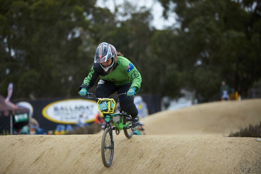 COMPETE: Caitlin Smith competes at the Ballarat Sebastopol Rebellion 2018 BMX event in February in the 16 girls category. Picture: Luka Kauzlaric