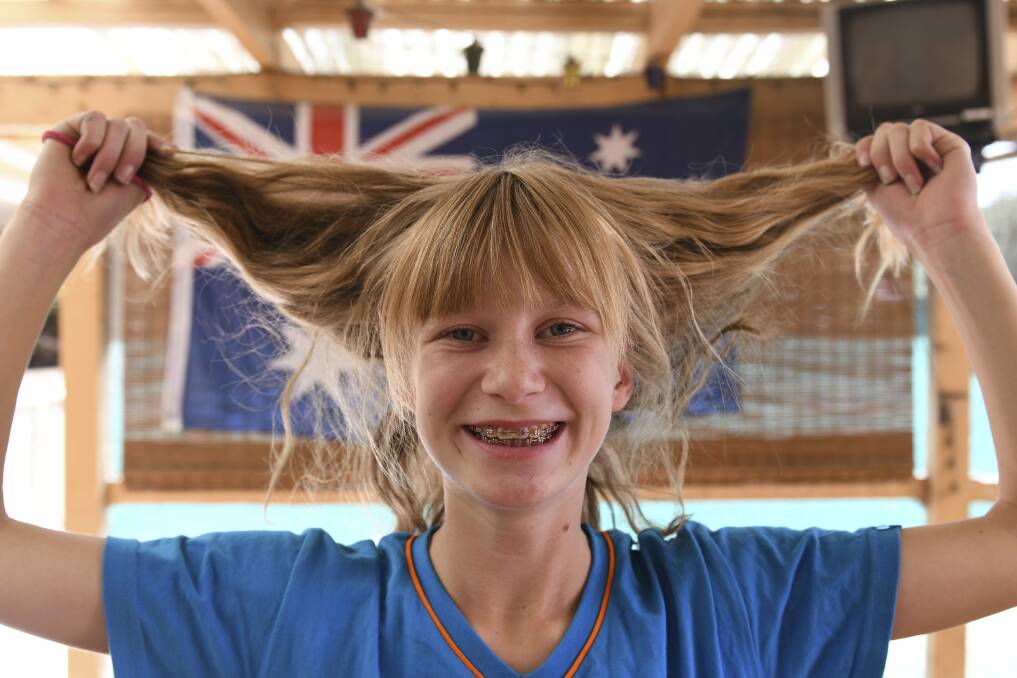 JUST HAIR: 14-year-old Tara Blobel will lose her golden locks when she shaves her head for the Lukemia Foundation on Saturday. Picture: Lachlan Bence 
