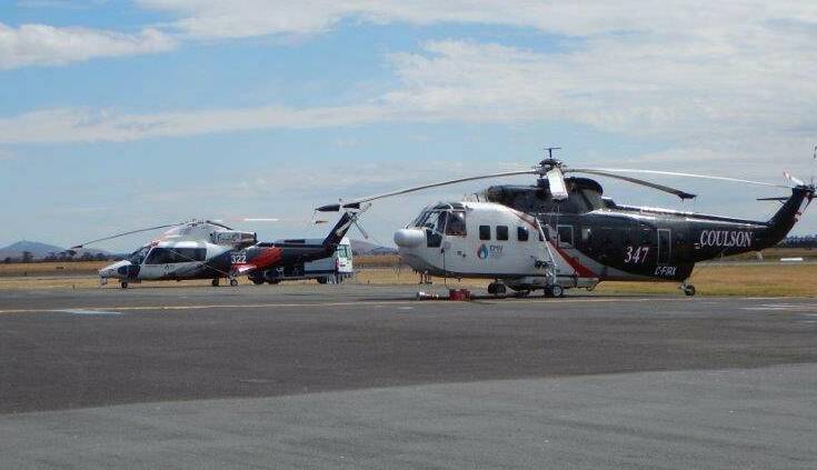 Firefighting helicopters at Ballarat Airport on Friday. Picture: Ballarat City Council