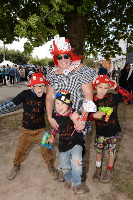 IN CHARACTER: Cat Hynes with Josh Hynes, 8, Travis Hynes, 4, and Lachlan Hynes, 6 have been to the festival for the past three years since they moved to Dales Creek. Picture: Kate Healy 