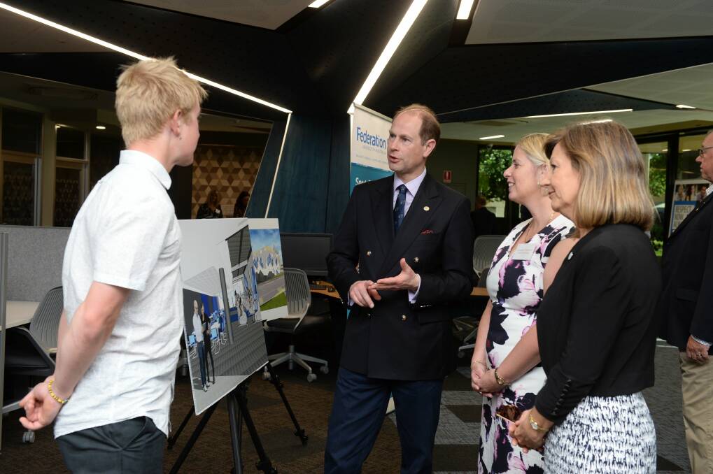 Prince Edward speaks to Federation University sports science student Liam White about plans for the new sports science facility. Picture: Kate Healy