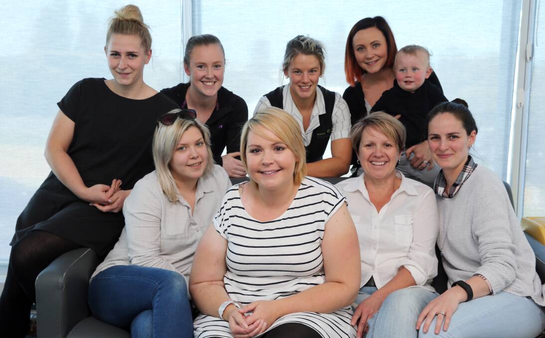 Hero wish: Amy Phillips (centre), surrounded by her mum and friends, has been diagnosed with a terminal cancer and would like to meet singer Robbie Williams when he visits Sydney on November 21. Picture: Rob Gunstone