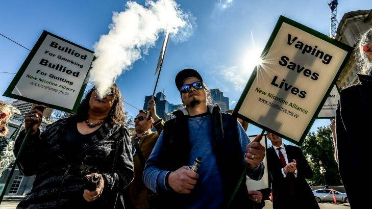 Beneath clouds of sickly sweet vapour the protesters rallied for their right to use electronic devices. Photo: Justin McManus