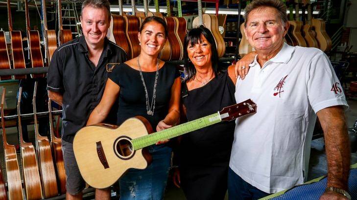 Maton Guitars owners Linda and Neville Kitchen (right) with their daughter Chantal de Fraga and son-in-law David Steedman at Maton's Box Hill Factory Photo: Eddie Jim