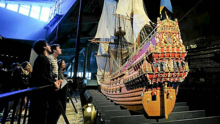 Visitors look at a model of the warship Vasa at the Vasamuseet museum in Stockholm, Sweden. Photo: Scanpix / Reuters