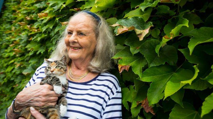 Virginia Edwards, pictured with Missy, has been honoured for her work as a volunteer at Lort Smith Animal Hospital in North Melbourne. Photo: Chris Hopkins