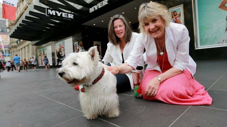 Robin Cowcher (left) and Corinne Fenton await the unveiling with dog Harry. Photo: Wayne Taylor