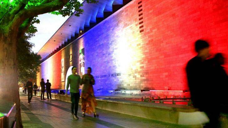 Walls of the NGV lit up in support of the Paris terror victims. Photo: Wayne hawkins