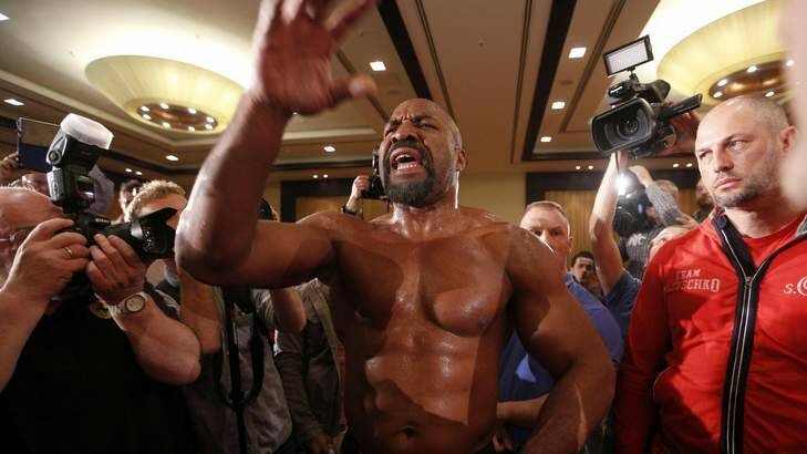 Former heavyweight champion Shannon Briggs invades the press conference with Alex Leapai and Wladimir Klitschko. Photo: Reuters/Ina Fassbender