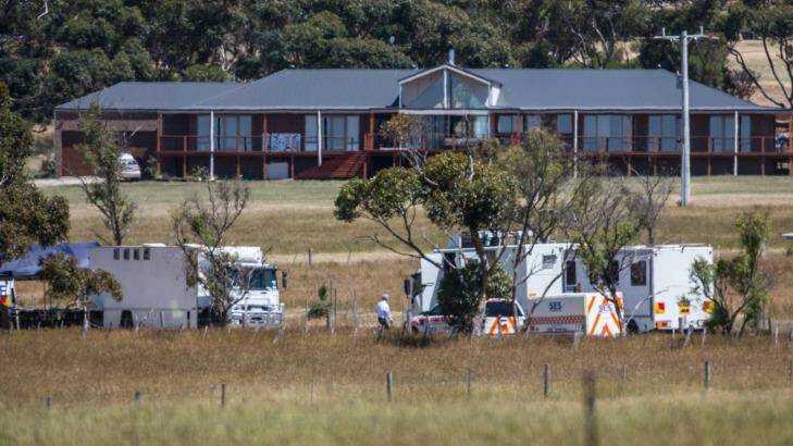 Police and SES search properties near Toolernvale in Melbourne's north-west on Monday. Photo: Jason South