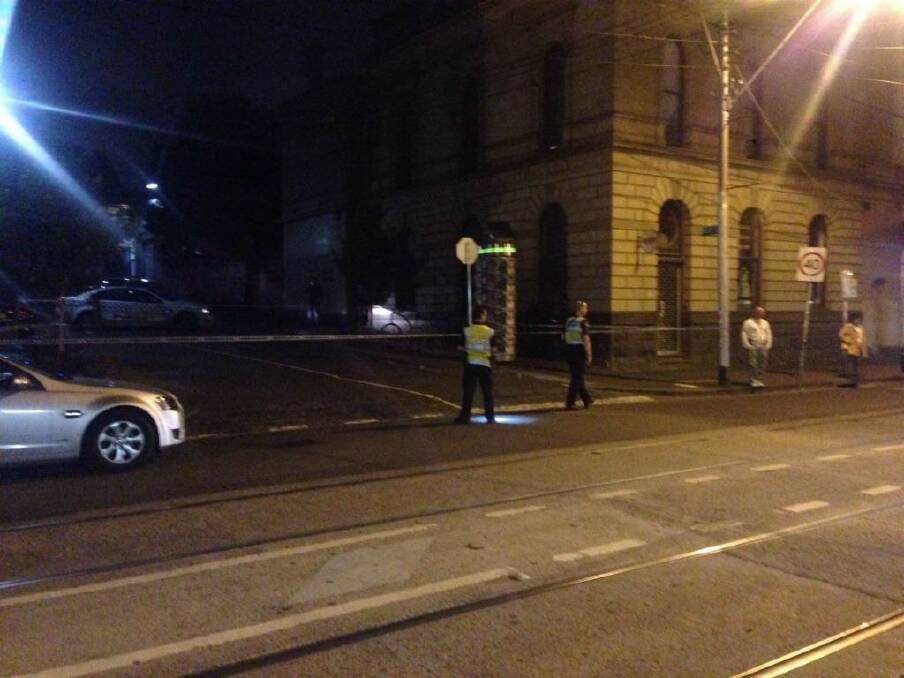 Police at the scene of a serious assault in Fitzroy on Friday night.  Photo: Patrick Hatch 