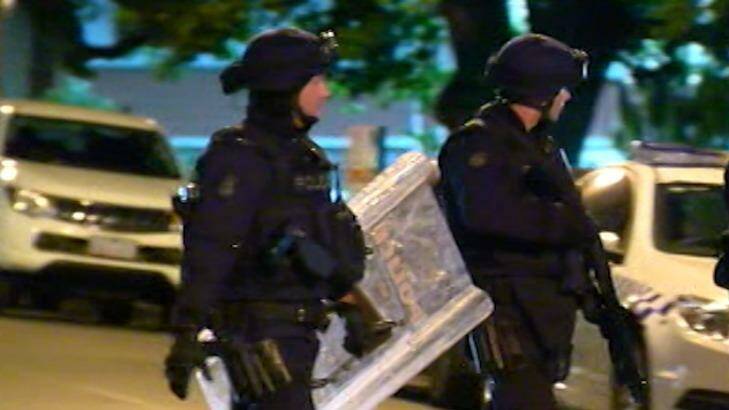 Police in full riot gear at Parkville. Photo: Courtesy: ABC News