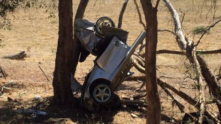 The wreckage of the Holden Commodore at Pyalong. Photo: Courtesy of Christie Cooper, Seven News