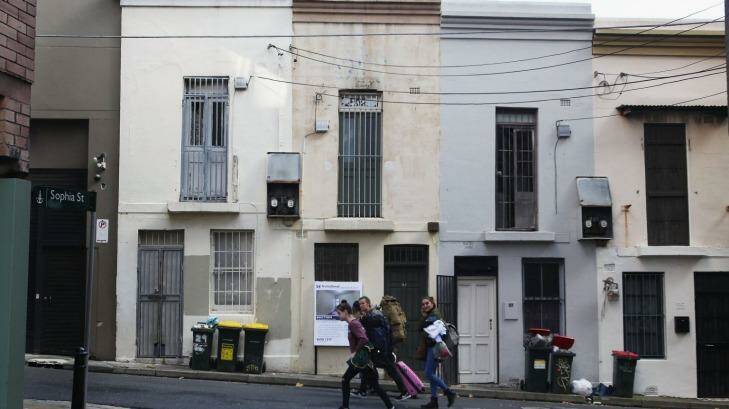 A two-bedroom Surry Hills terrace on 38 square metres sold for almost $1 million at auction on Saturday. Photo: Fiona Morris