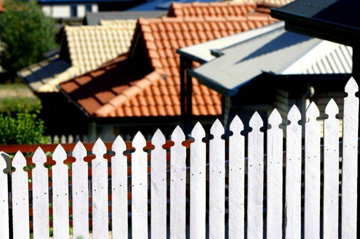 REALESTATE AFR PHOTOGRAPH BY GLENN HUNT 30 OCTOBER 2007. GENERIC- houses, interest rates, building, house market, housing, home, homes, springfield lakes, real estate, construction, renting, land. Suburbs AFR FIRST USE ONLY SPECIALX 00000000 white picket fence; roofs Picket fence flipped Photo: Glenn Hunt