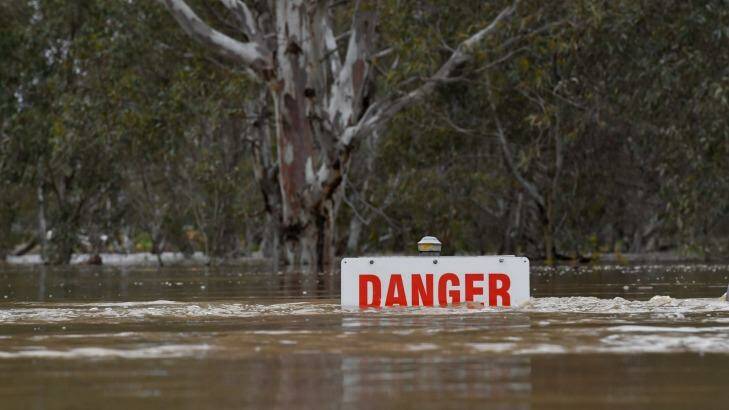 Danger sign at the Avoca River in Charlton which is set to peak on Thursday.   Photo: Joe Armao