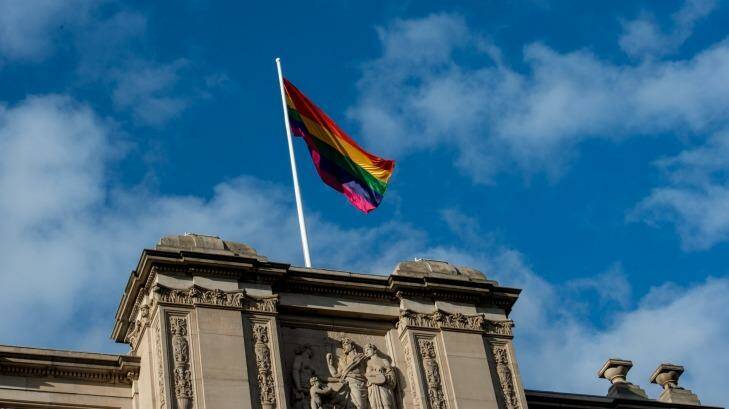 The rainbow flag flying at Parliament House on the day The Victorian Parliament apologised to gay men for criminal convictions in the past.   Photo: Penny Stephens