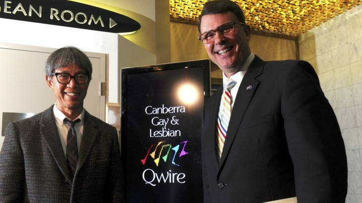 U.S. ambassador John Berry and his partner Curtis Yee at a function at the Hellenic Club, Woden where the Canberra Gay
and Lesbian Qwire performed. Hours earlier the US Supreme Court had made same-sex marriage legal in all 50 American states.  Photo: Graham Tidy