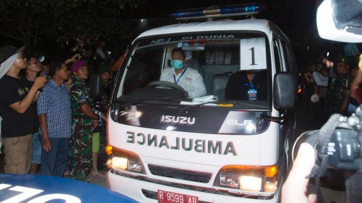 One of the ambulances carrying a coffin of one of the executed leaving Wijaya Pura in Cilacap. Photo: James Brickwood