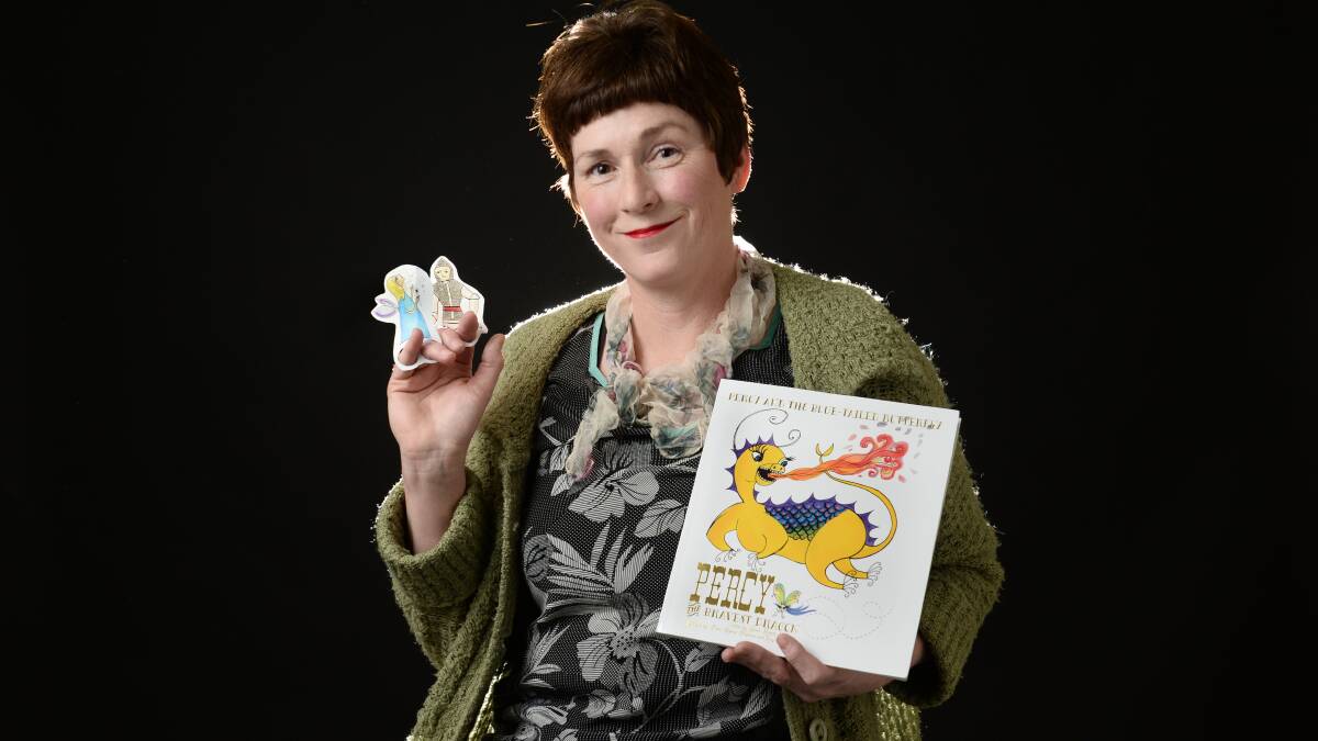 FAMILY legacy: Lucy Brisbane and the book Percy and the Blue-Tailed Butterfly. Lucy s father, Alan Brisbane, created the story for his children. 
character Percy the Bravest Dragon in the 1960s