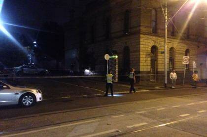 Police at the scene of a serious assault in Fitzroy on Friday night.  Photo: Patrick Hatch 