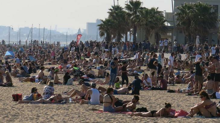 By Friday afternoon, St.Kilda Beach was packed with people. Photo: Leigh Henningham