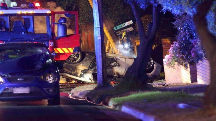 A vehicle on its roof after it clipped another car during a street race. Photo: Patrick Herve