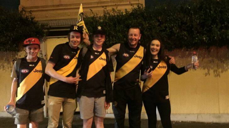 Ecstatic Tigers fans paint the town yellow and black