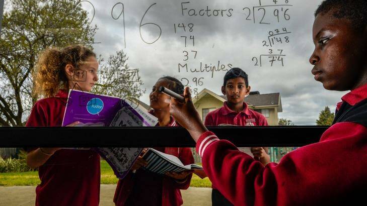 Year 6 students Holly, Nobel, Andrew and Joshua from Harrisfield Primary School in Noble Park. The school has performed well in NAPLAN. Photo: Penny Stephens