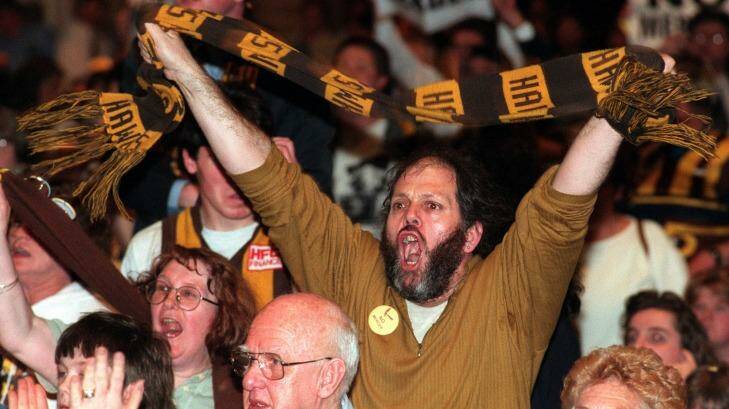 There was a vocal crowd at the Camberwell meeting.


Angry Hawthorn supporters at the merger meeting at Camberwell Civic Centre Photo: Sebastian Costanzo