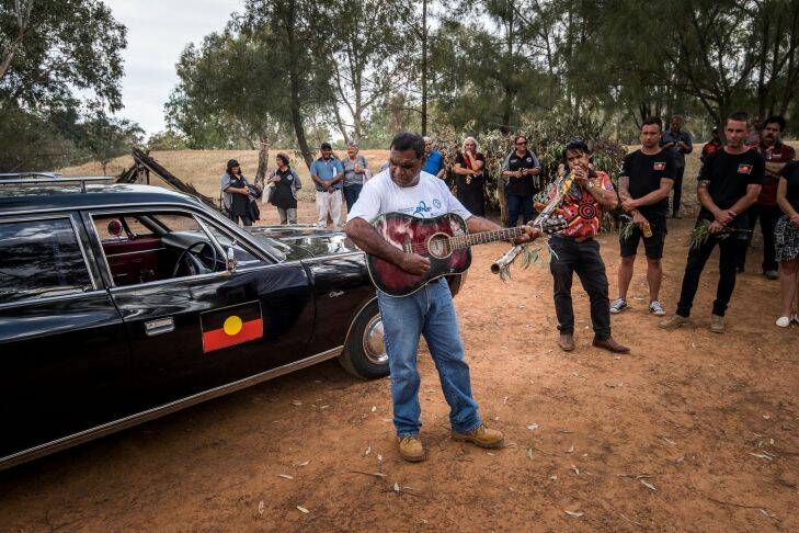 The Age, News, 15/11/2017, photo by Justin McManus.
Repatriation of Mungo Man's remains along with 104 other ancient ancestors back to conutry at Lake Mungo. The remains will be taken from thre National Museum of Australia's  storage faciclity in Canberra in the old Aboriginal hearse accompanied by elders from the Willandra region - the Mutthi Mutthi, Paakantyi?????? and Ngiyampaa?????? people. They will travel and be welcomed with ceremony from local elders at Wagga Wagga, Hay and Balralnald before being laid to rest at Lake Mungo. A song about Mungo Man and Lady at the Ceremony in Wagga Wagga.