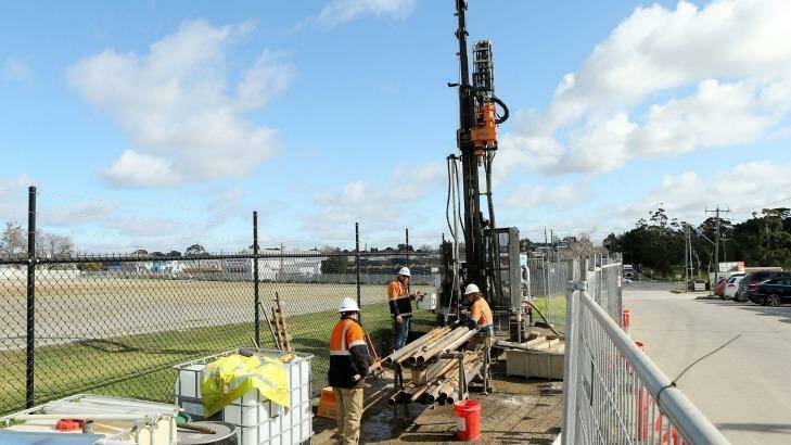 Transurban site investigators are seen drilling on the proposed Western Distributor toll road in Yarraville. Photo: Pat Scala