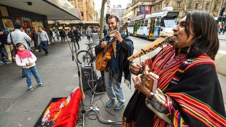 Buskers are going to be banned from using amplifiers when performing on Swanston Street. Photo: Justin McManus 