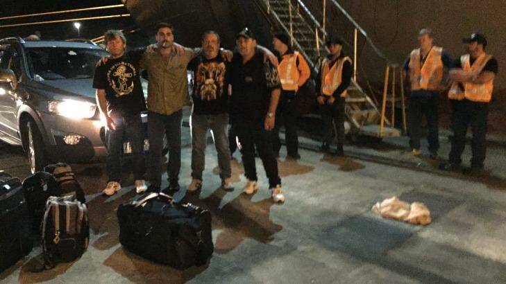 Crew members of the MV Portland on the wharf after being removed from their ship in the early hours of Wednesday morning. Photo: Supplied