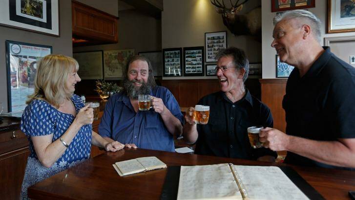 Llewella Bates, Mick Stevens, Stuart McArthur and Tim Dorgan toast the end of their pub crawl at the Clyde Hotel in Carlton on Saturday. Photo: Meredith O'Shea