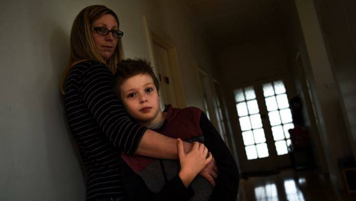 Lisa Whittam with son Lucas, who has autism and is being overlooked in the state education system. Photo: Justin McManus