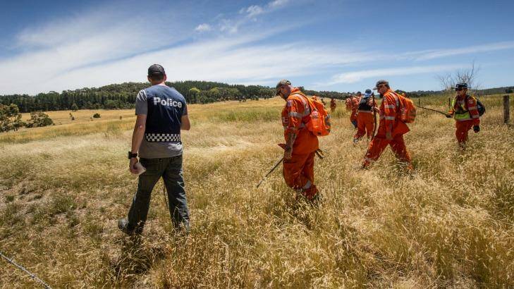 Police and SES crews at Toolen Vale on Monday. Photo: Jason South