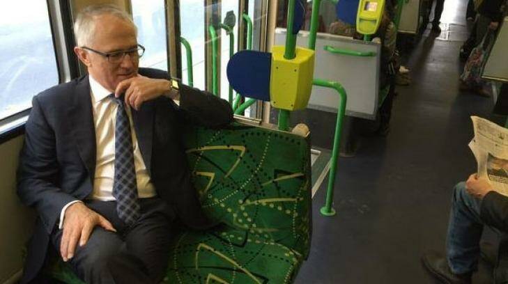 'Eerily quiet' ... Prime Minister Malcolm Turnbull rides the tram in the Docklands on Friday morning. Photo: Twitter