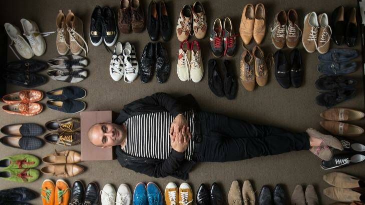 Shoes and more shoes maketh the man. Joe Avati with his designer collection.  Photo: Simon Schluter