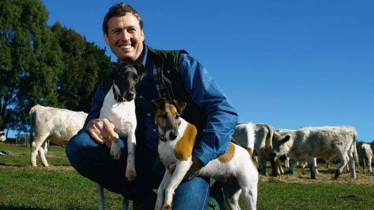 The late interior designer Stuart Rattle with his fox terriers at Musk Farm in Daylesford. Photo: Eamon Gallagher