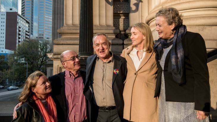 Peter McEwan and some of his siblings outside Parliament House after the state apology.  Photo: Penny Stephens