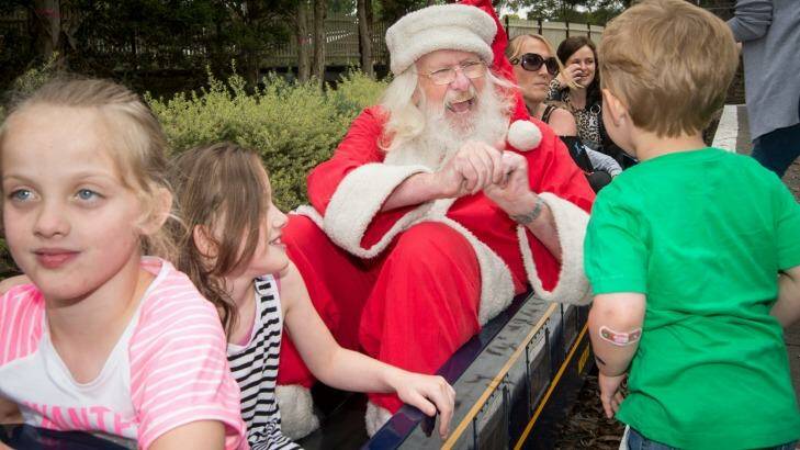 Santa, aka Stephen Fox, volunteers his services at Kalparrin centre for special needs children's Christmas party in Eltham.  Photo: Penny Stephens