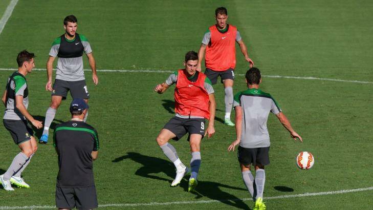 The Socceroos train in Newcastle on Sunday.
 Photo: Peter Stoop